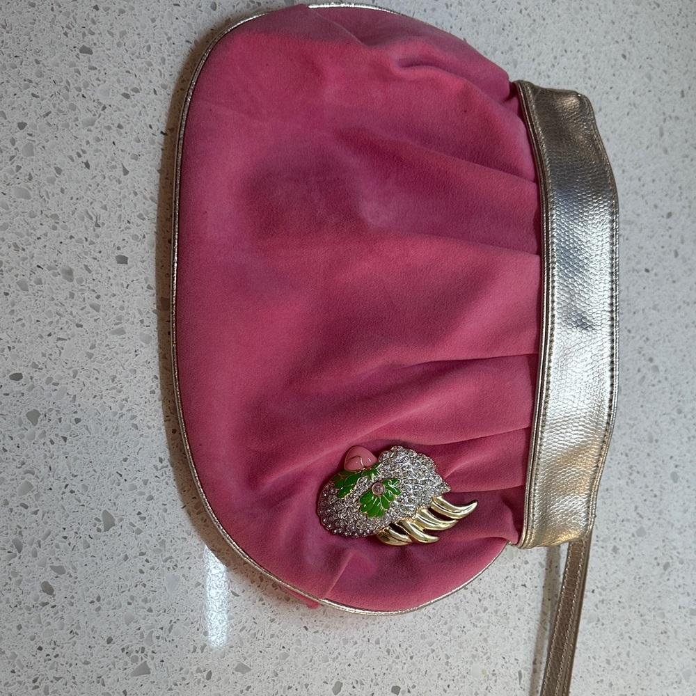 Elegant Lilly Pulitzer Pink and Gold Clutch with striking parrot broach on front